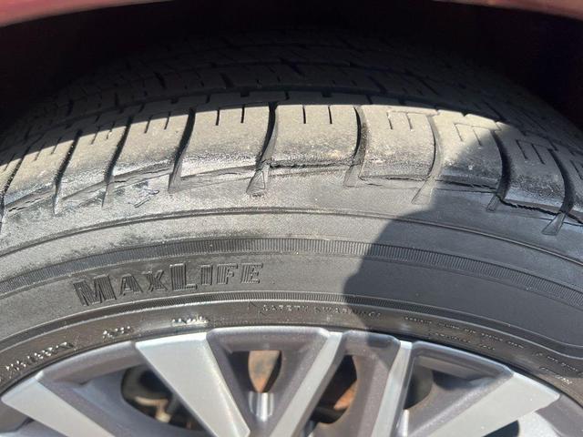 Photo of 2023 Garnet Pearl Nissan Altima