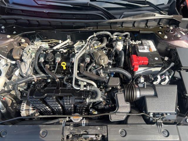 Photo of 2023 Garnet Pearl Nissan Altima