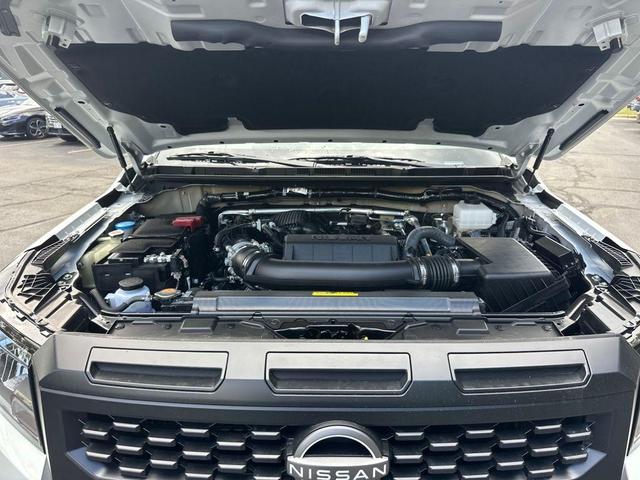 Photo of 2025 Glacier White Nissan Frontier