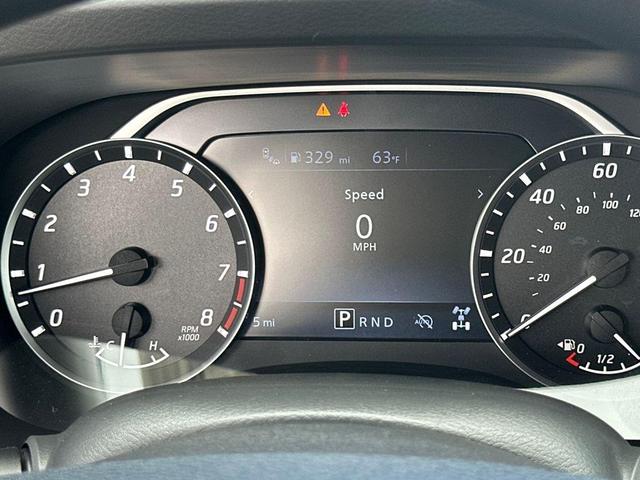 Photo of 2025 Glacier White Nissan Frontier