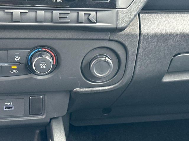 Photo of 2025 Glacier White Nissan Frontier