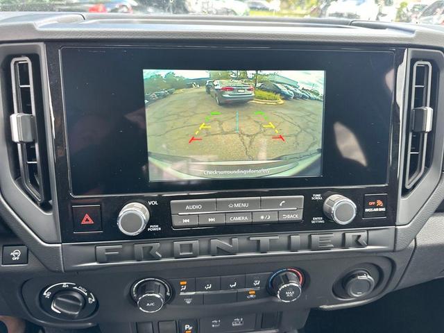 Photo of 2025 Glacier White Nissan Frontier