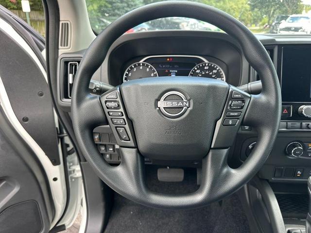Photo of 2025 Glacier White Nissan Frontier