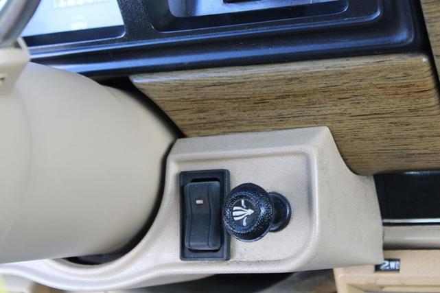 Photo of 1990 Sand Metallic Jeep Grand Wagoneer