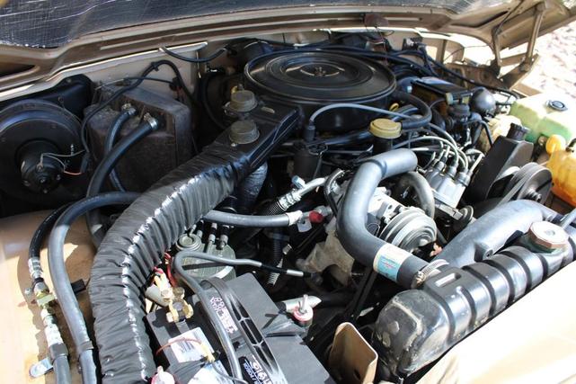 Photo of 1990 Sand Metallic Jeep Grand Wagoneer