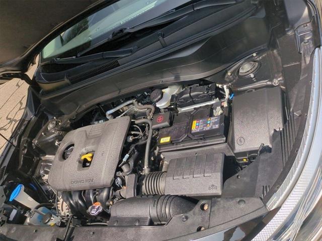 Photo of 2022 Cherry Black Kia Seltos