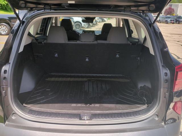 Photo of 2022 Cherry Black Kia Seltos