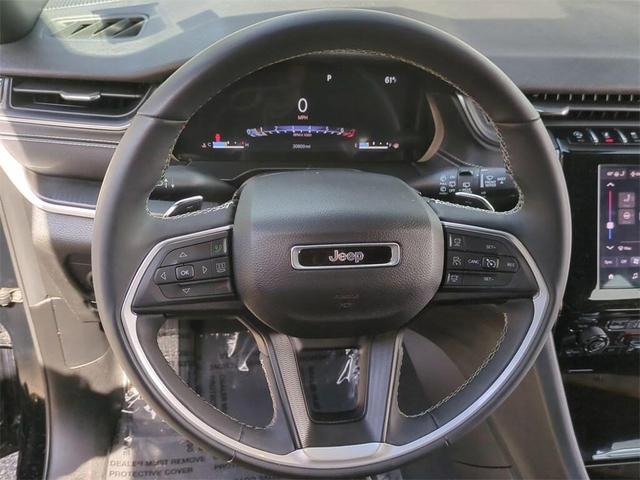 Photo of 2023 Diamond Black Crystal Pearlcoat Jeep Grand Cherokee