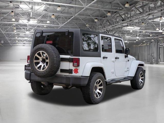 Photo of 2016 Bright White Clearcoat Jeep Wrangler Unlimited