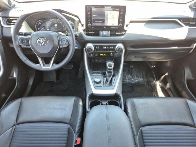 Photo of 2019 White Toyota RAV4 Hybrid