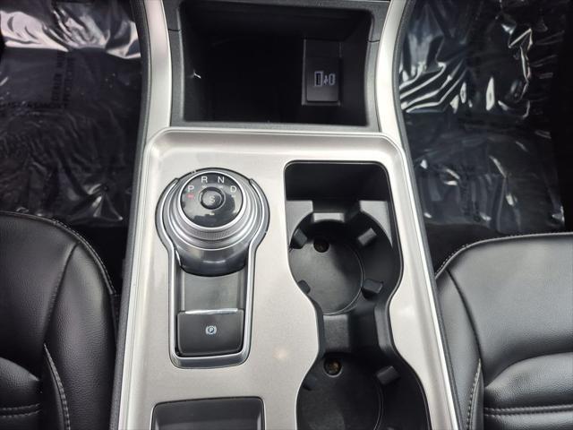 Photo of 2024 Black Metallic Ford Edge