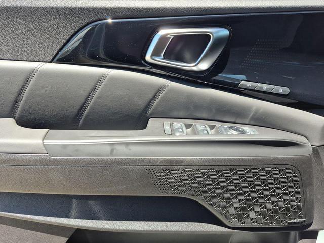 Photo of 2026 Ivory Silver Kia Carnival Hybrid