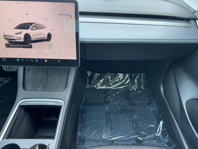 Photo of 2023 Pearl White Multi-Coat Tesla Model 3