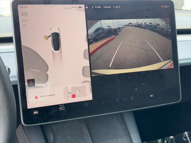 Photo of 2023 Pearl White Multi-Coat Tesla Model 3