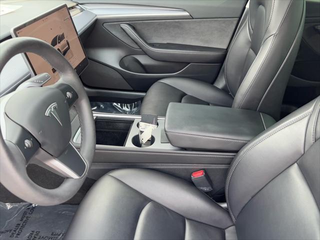 Photo of 2023 Pearl White Multi-Coat Tesla Model 3