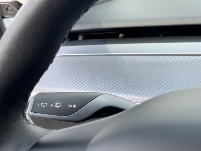 Photo of 2023 Pearl White Multi-Coat Tesla Model 3