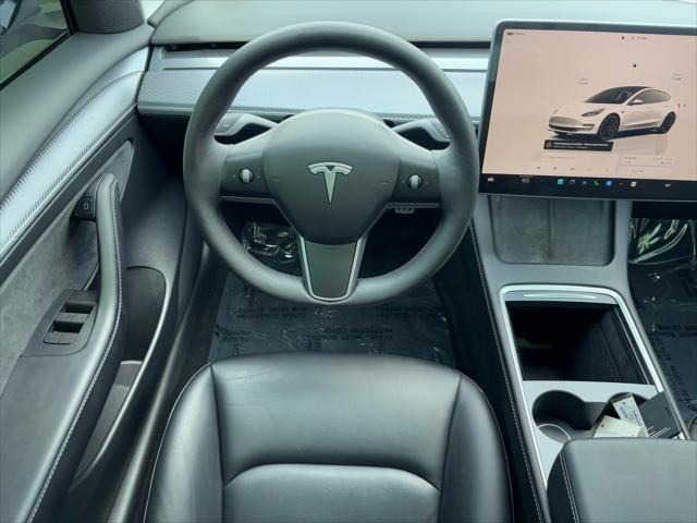 Photo of 2023 Pearl White Multi-Coat Tesla Model 3
