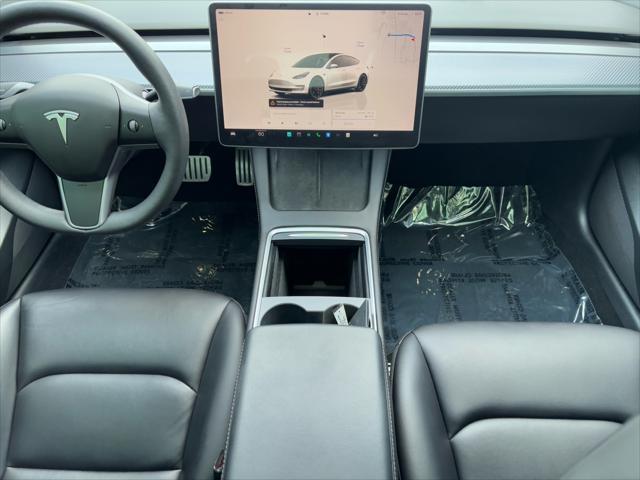 Photo of 2023 Pearl White Multi-Coat Tesla Model 3