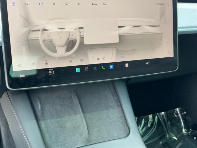 Photo of 2023 Pearl White Multi-Coat Tesla Model 3