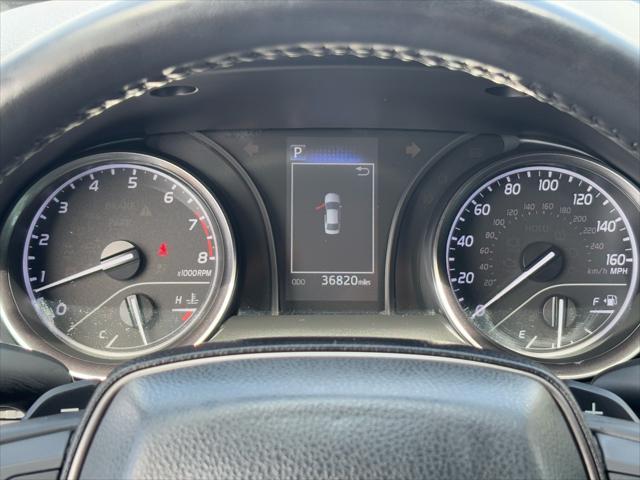 Photo of 2023 Midnight Black Metallic Toyota Camry