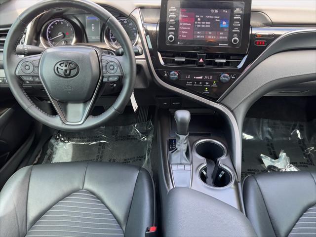 Photo of 2023 Midnight Black Metallic Toyota Camry