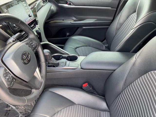 Photo of 2023 Midnight Black Metallic Toyota Camry