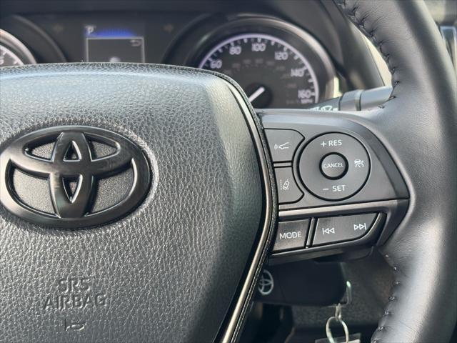 Photo of 2023 Midnight Black Metallic Toyota Camry