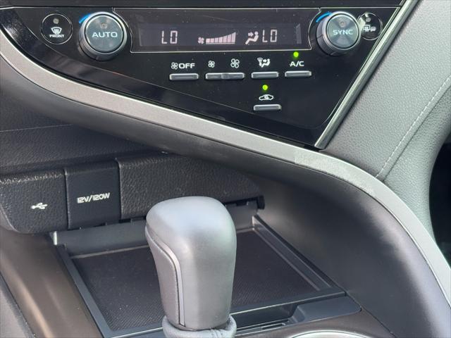 Photo of 2023 Midnight Black Metallic Toyota Camry