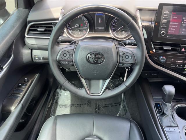 Photo of 2023 Midnight Black Metallic Toyota Camry