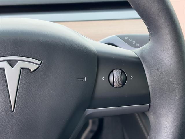 Photo of 2023 Pearl White Multi-Coat Tesla Model Y