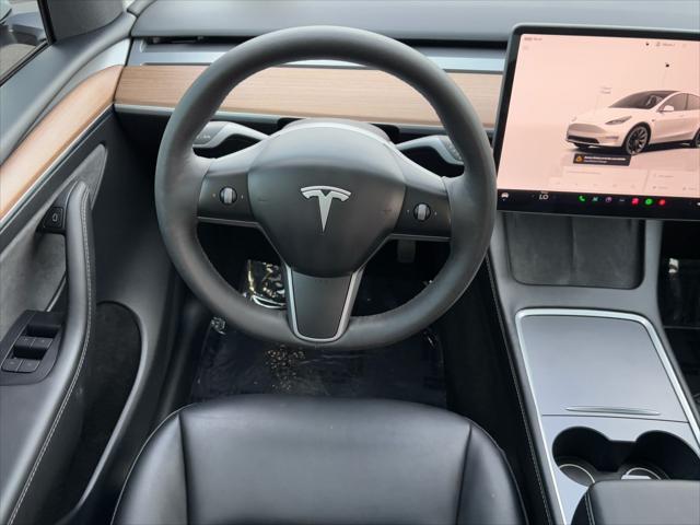 Photo of 2023 Pearl White Multi-Coat Tesla Model Y