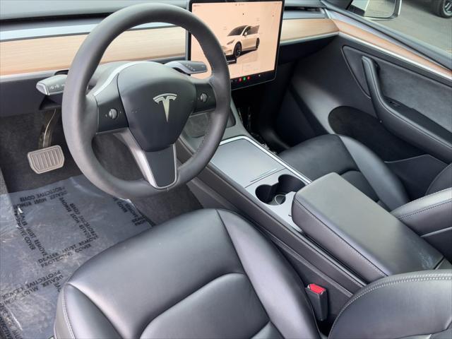 Photo of 2023 Pearl White Multi-Coat Tesla Model Y