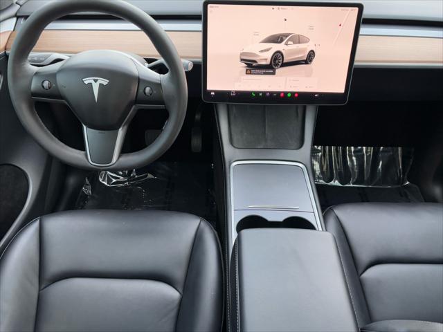 Photo of 2023 Pearl White Multi-Coat Tesla Model Y