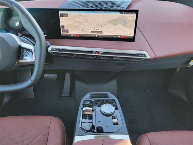 Photo of 2024 Black Sapphire Metallic BMW iX