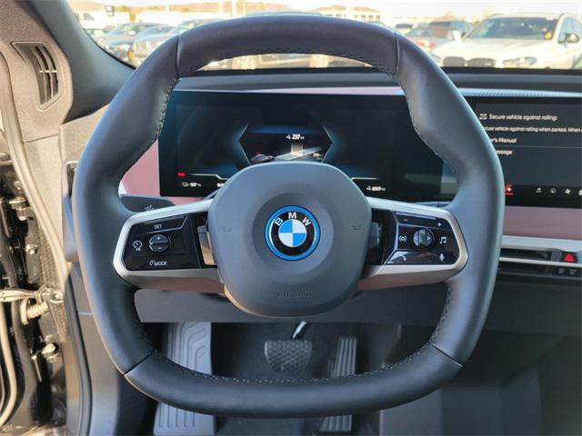 Photo of 2024 Black Sapphire Metallic BMW iX