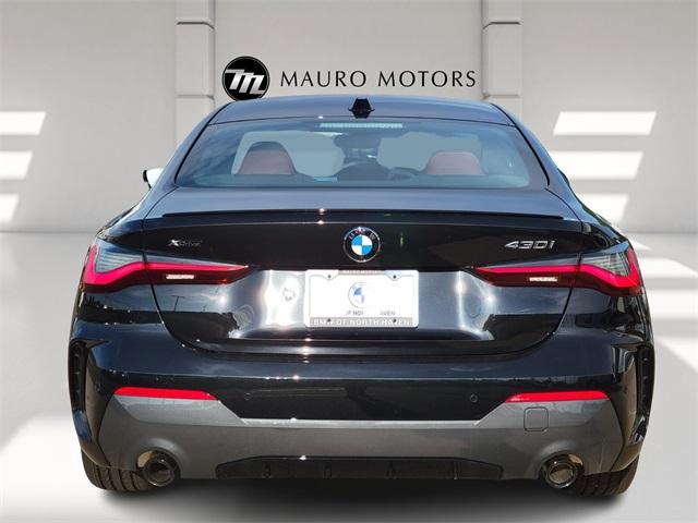 Photo of 2024 Black Sapphire Metallic BMW 430