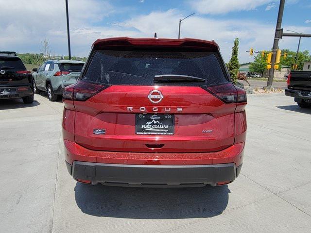 Photo of 2025 Scarlet Ember Tintcoat Nissan Rogue