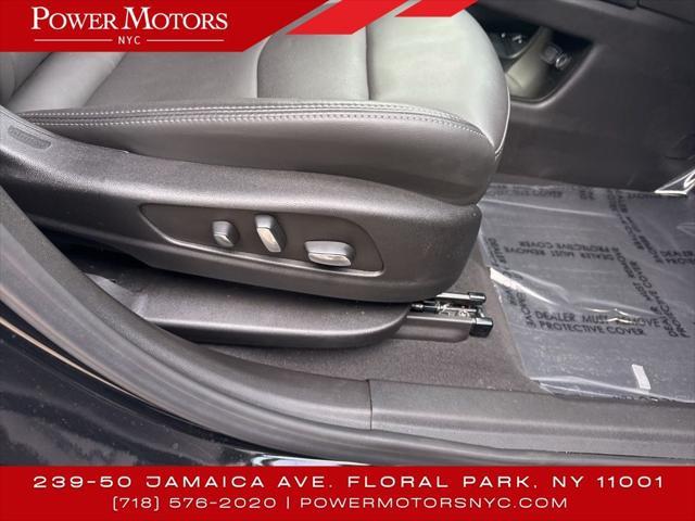 Photo of 2024 Stellar Black Metallic Cadillac XT6
