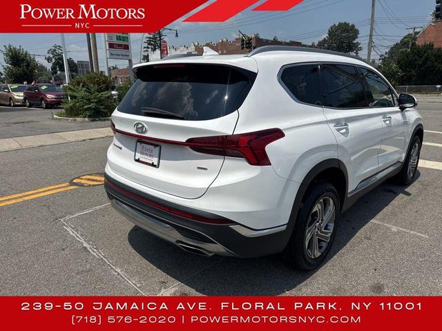 Photo of 2023 Serenity White Pearl Hyundai SANTA FE