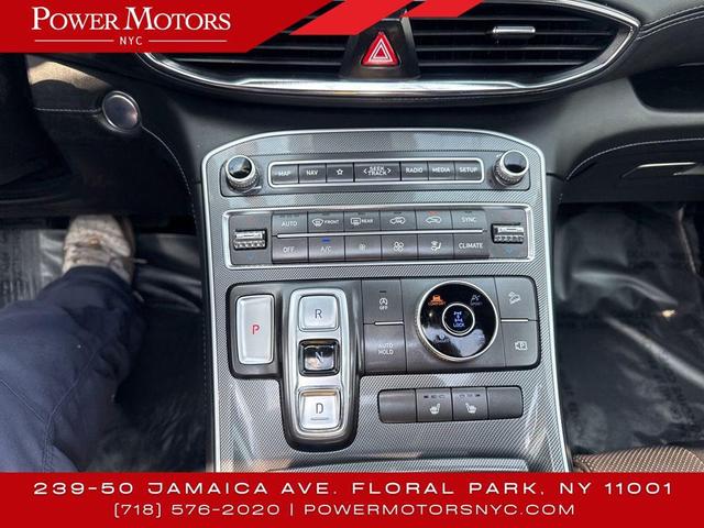 Photo of 2023 Serenity White Pearl Hyundai SANTA FE