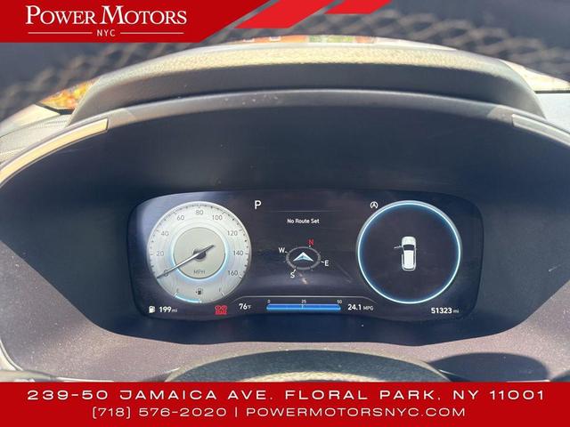 Photo of 2023 Serenity White Pearl Hyundai SANTA FE