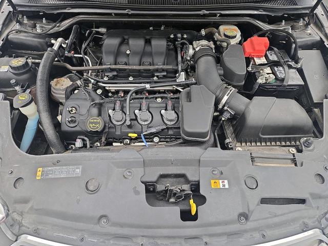 Photo of 2014 Black Ford Taurus