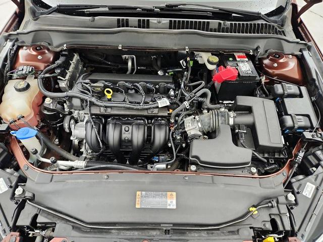 Photo of 2015 Burgundy Ford Fusion