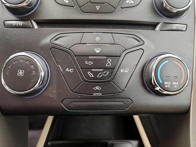 Photo of 2015 Burgundy Ford Fusion