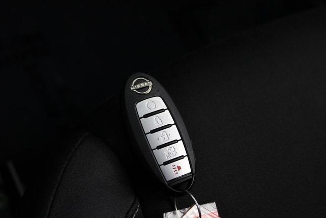 Photo of 2023 Garnet Pearl Metallic Nissan Altima