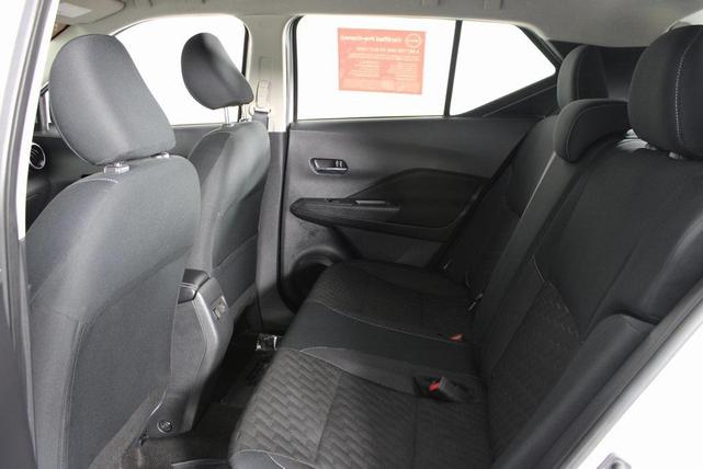 Photo of 2023 Aspen White Tricoat Nissan Kicks