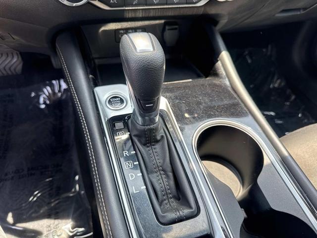 Photo of 2023 Scarlet Ember Tintcoat Nissan Altima