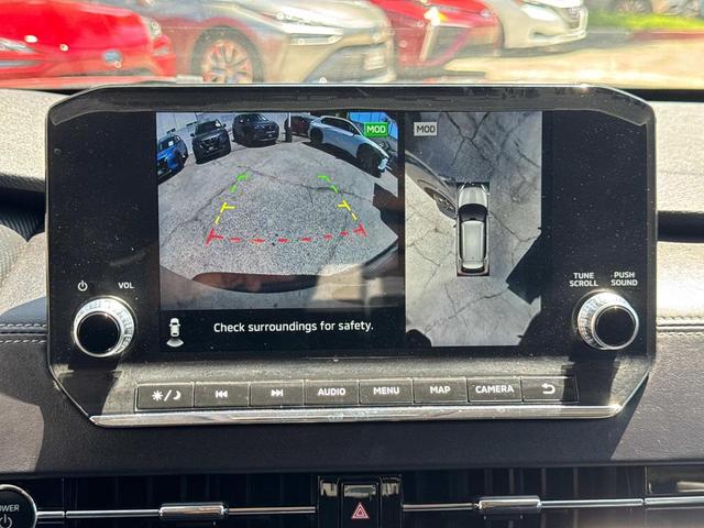 Photo of 2023 Black Diamond/Deep Bronze Metallic Mitsubishi Outlander PHEV