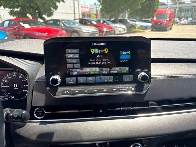 Photo of 2023 Black Diamond/Deep Bronze Metallic Mitsubishi Outlander PHEV
