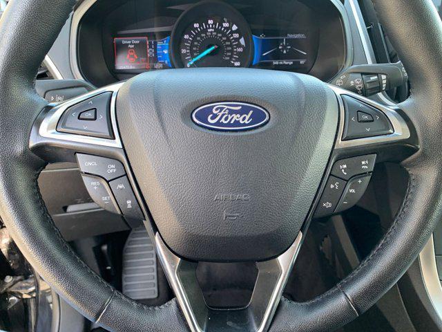 Photo of 2024 Agate Black Metallic Ford Edge